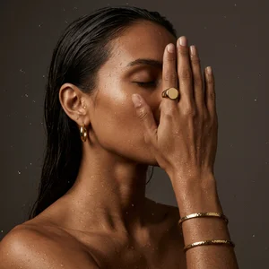Wet skin gold jewelry editorial