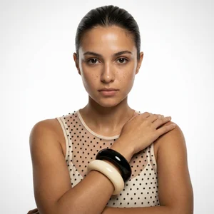 Bold chunky bangles on model