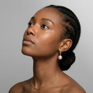 Elegant model with pearl earring