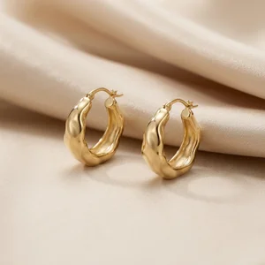 Chunky gold hoops on silk