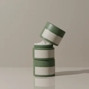 Stacked green cosmetic jars