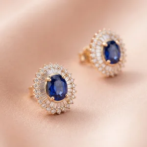 Elegant sapphire earrings on pink