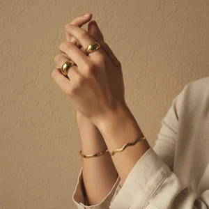 Delicate bracelets on hands