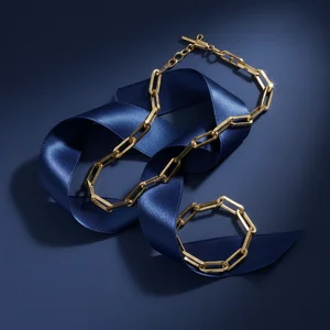 Gold chain on blue silk