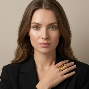 Geometric gold ring on model portrait