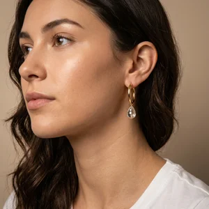 Elegant teardrop earring on model