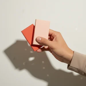 Hand holding wellness sachets