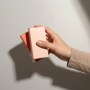 Hand holding wellness sachets