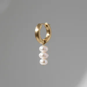 Pearl charm gold hoop earring