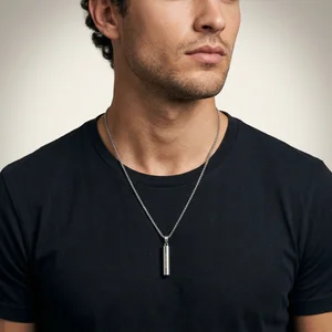 Men's silver necklace on model