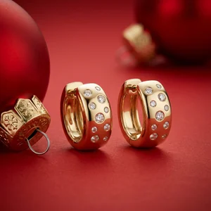 Festive gold diamond earrings