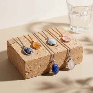 Gemstone necklaces on natural brick