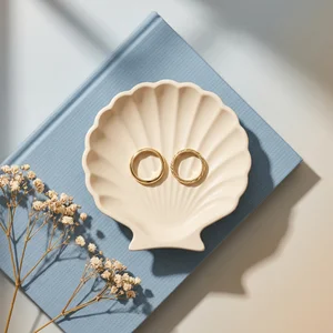 Elegant rings in seashell dish