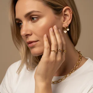 Elegant gold jewelry on model
