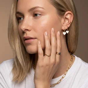 Elegant gold jewelry on model