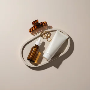 Minimalist skincare on textured dish