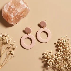 Natural clay earrings flat lay