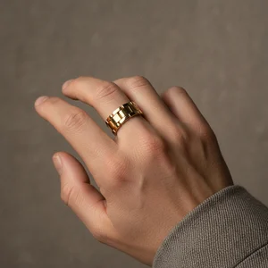 Bold Gold Ring & Stylish Attire