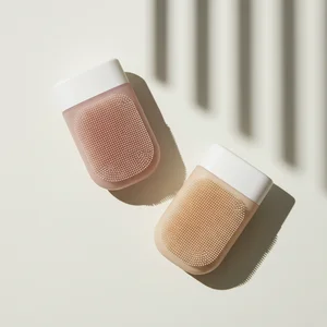 Pink ergonomic massage brush