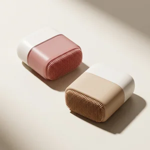 Pink ergonomic massage brush