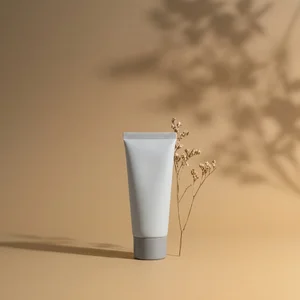 Natural skincare tube on beige