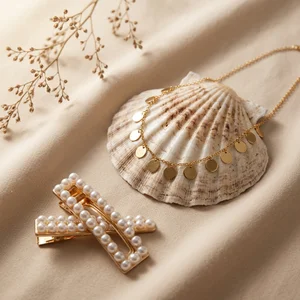 Delicate gold jewelry on shell