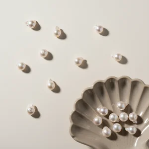Delicate pearl accessory flat lay