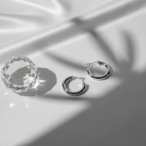 Elegant silver rings on satin