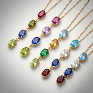 Colorful gemstone necklaces on gray