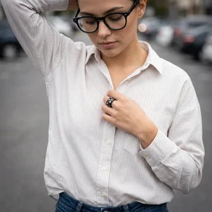 Adjusting a shirt button