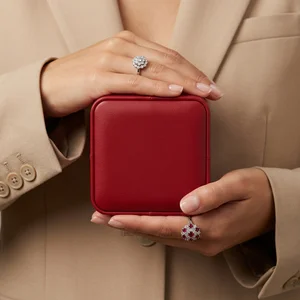Luxury red box held by hands