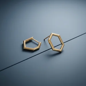 Geometric gold earrings on blue