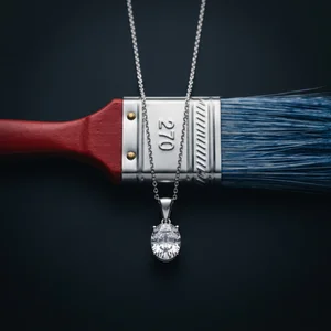 Artistic jewelry on paintbrush