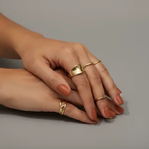 Golden rings on elegant hand