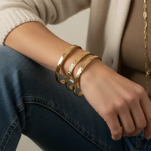 Elegant gold jewelry hand stack