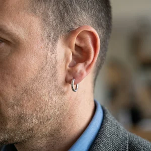 Mens silver hoop earring on model