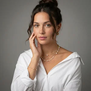 Model with pearl jewelry in studio