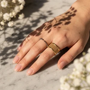 Elegant rings on marble with shadows