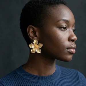 Elegant gold earring portrait