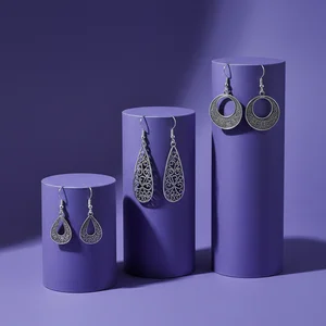 Elegant Earrings on Purple Stands