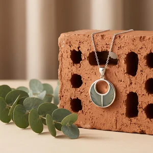 Modern necklace on rustic brick