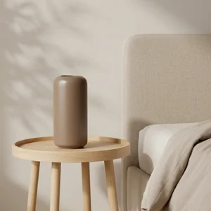 Minimalist bedroom with leaf shadows