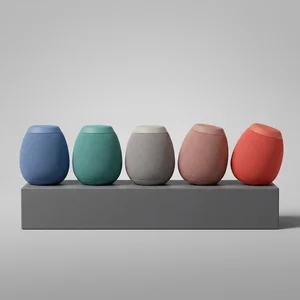 Colorful smart speakers on gray ledge