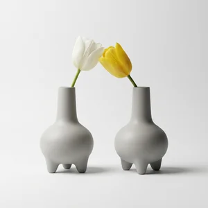 Minimalist ceramic vases with tulips