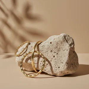 Elegant gold bracelet on stone