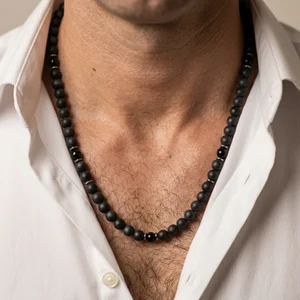 Men's black bead necklace on model