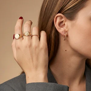 Gold jewelry on female model