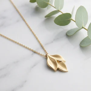 Elegant gold necklace on marble