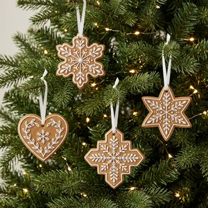 Festive lit tree with four ornaments