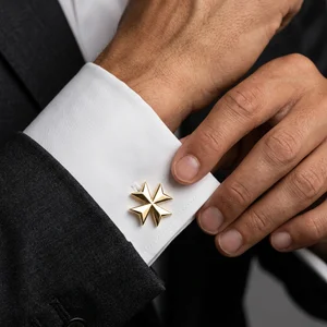 Luxury gold cufflink on suit